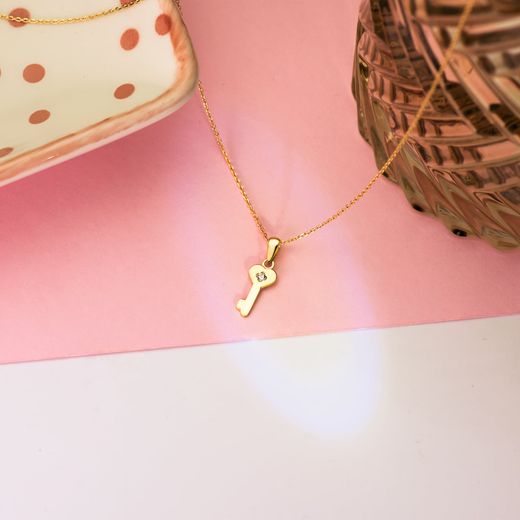 18K Colgante Oro Amarillo Llave Lisa En Brillo Con Circonita 14 X 6 Mm