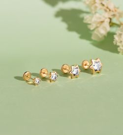 18K Pendientes Oro Amarillo Estrella Con Circonita. Medida: 6X5,5 Mm. Cierre Presion