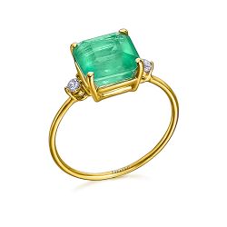 Anillo oro cuarzo central y topacio
