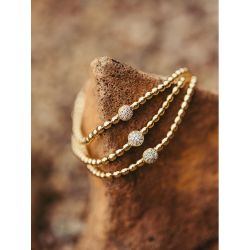 Brazalete oro rosetón brillantes