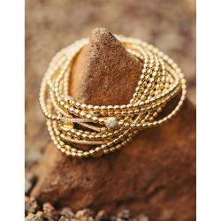 Brazalete oro rosetón brillantes