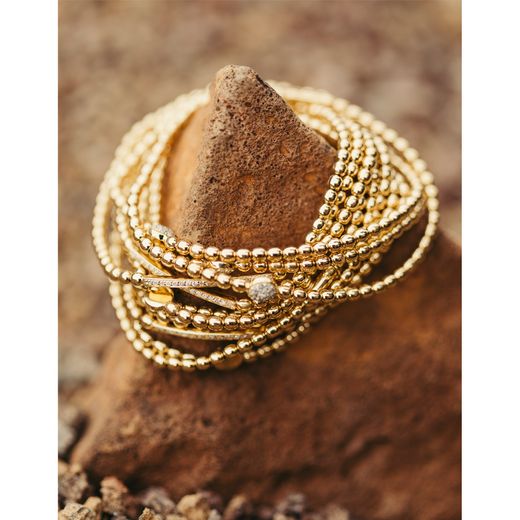 Brazalete oro rosetón brillantes