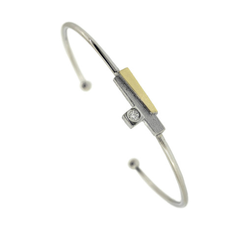 Pulsera de plata rodiada, oro de 18k y brillante de 0.04ct. Muy llevable